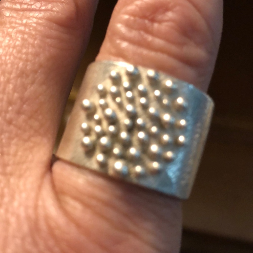 Sterling silver beaded and etched band.